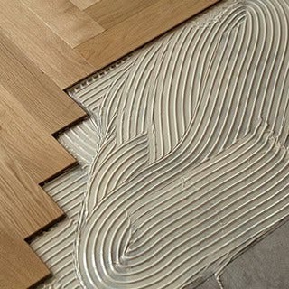 Flooring adhesives and sealants